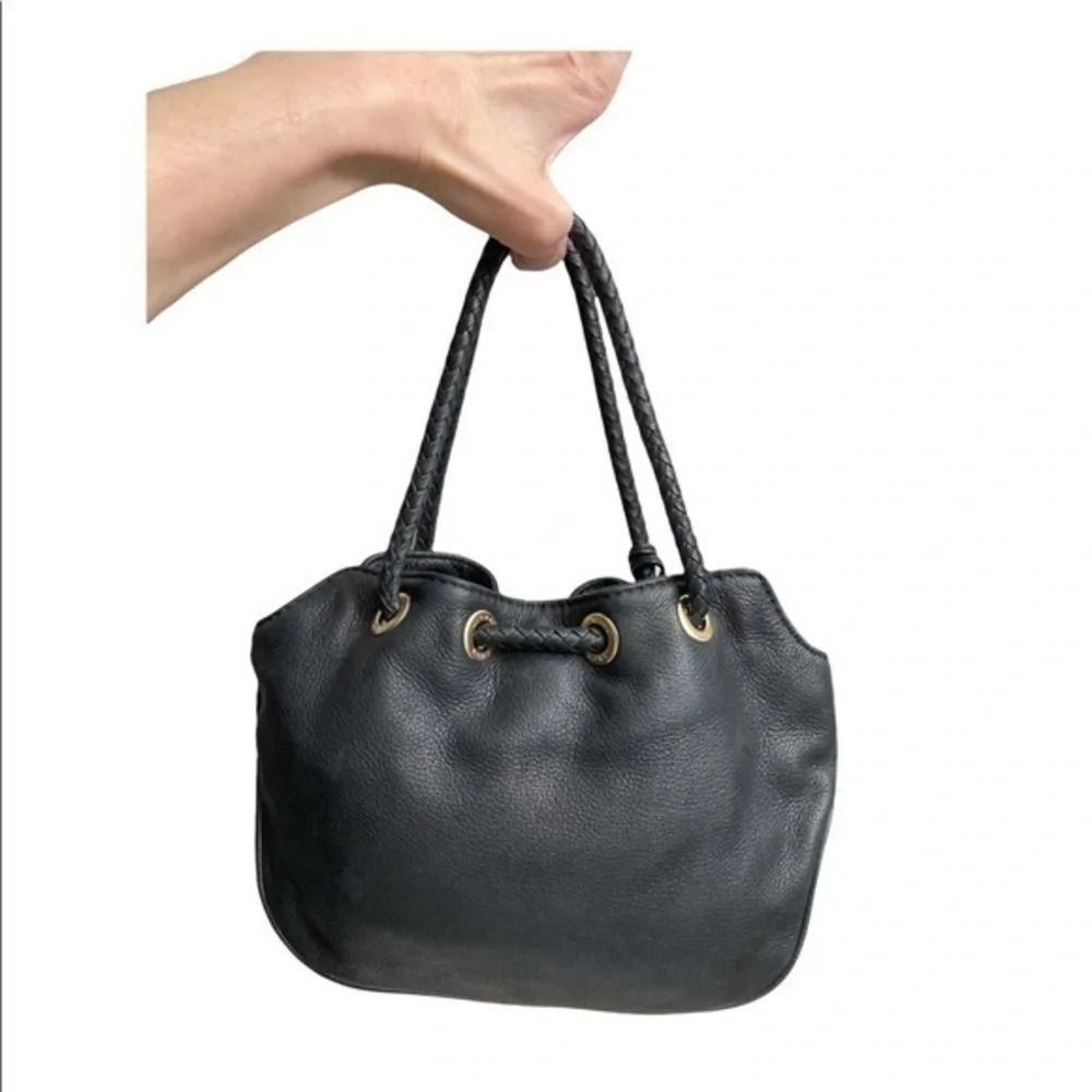 Michael kors mini black leather drawstring bag